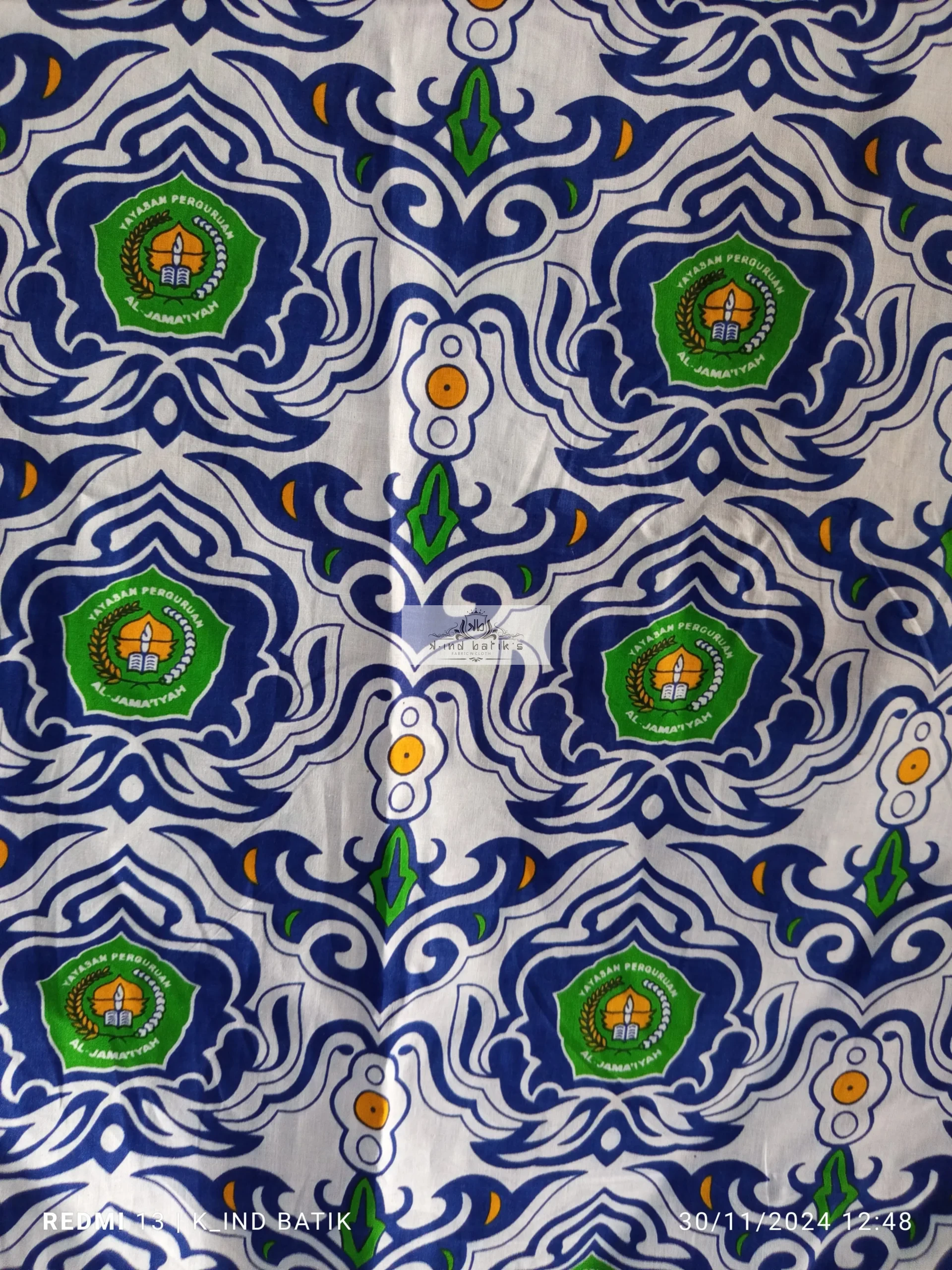 Produksi kain batik seragam sekolah custom logo berkualitas