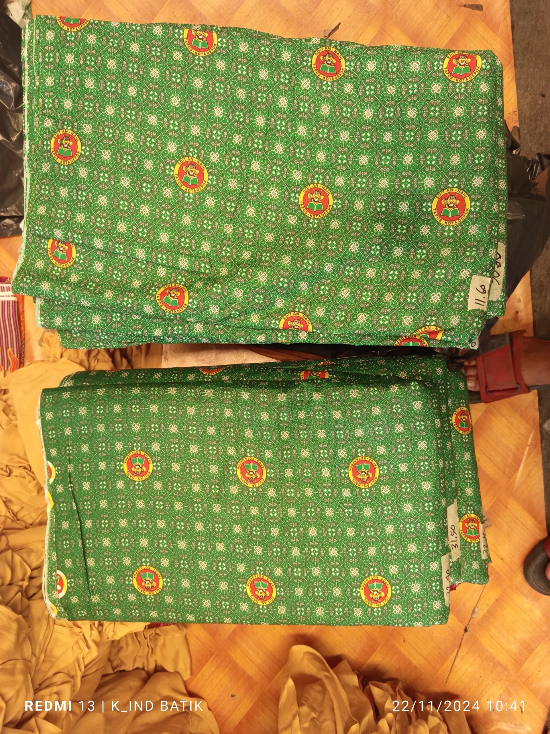 Produksi kain batik seragam sekolah custom logo berkualitas
